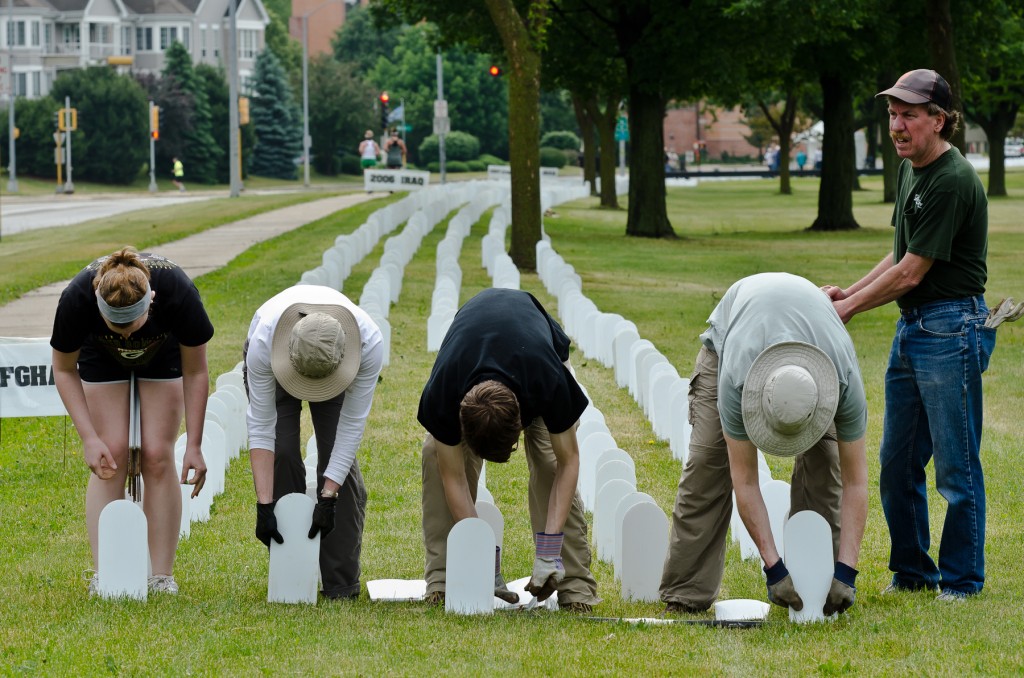 Volunteers are critical to installation of the 6,000+ tombstones (Photo by Paul McMahon)