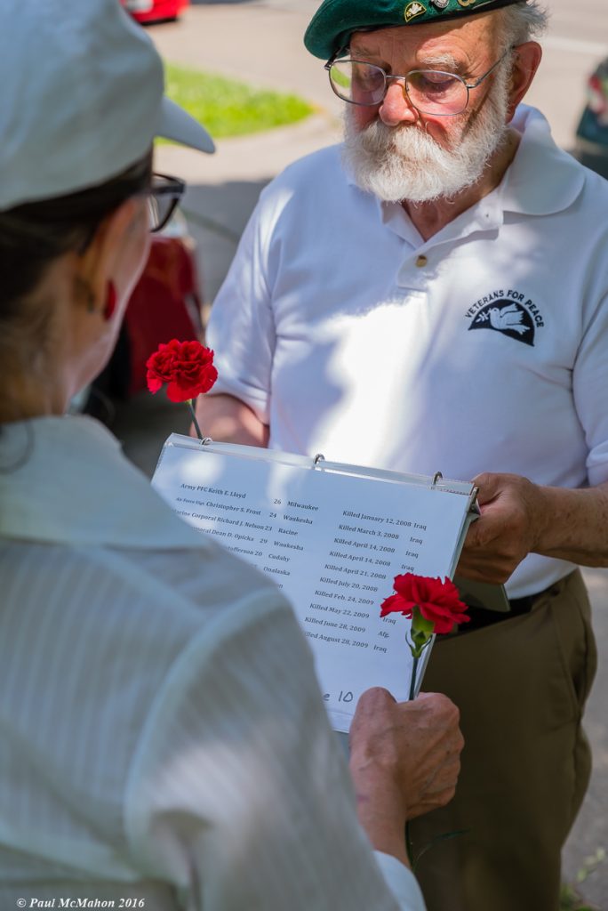 Reading names of WI service members killed in Iraq and Afghanistan, Photo by Paul McMahon